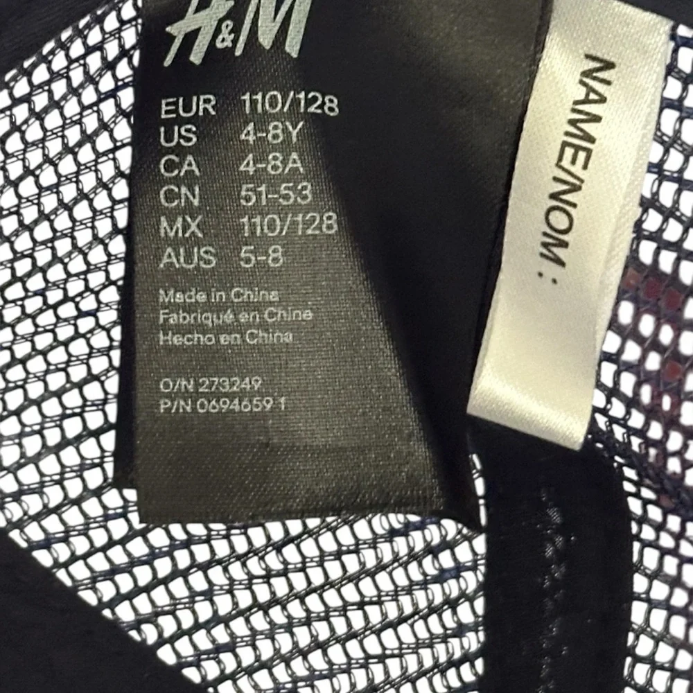 H&M woven fabric cap with a front Malibu Beach motif.NWOT.